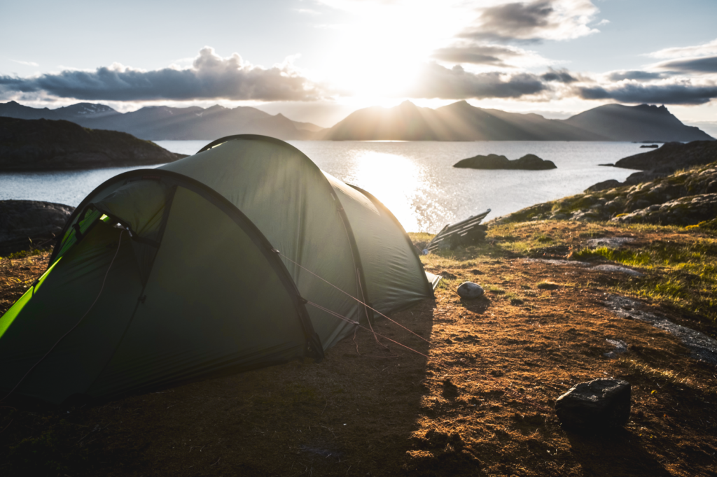 wild camping in a tent along the ocean