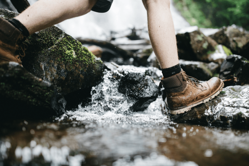 waterproof hiking boots in a stream