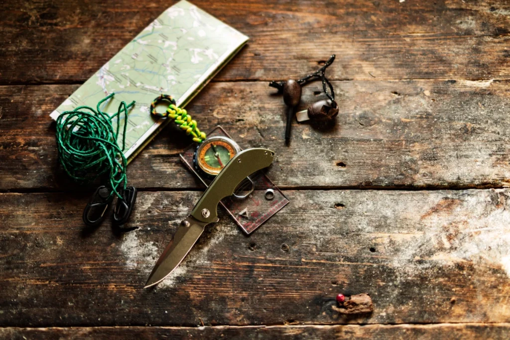 a photo of several common survival tools to accompany the article 10 survival skills everyone should know.
